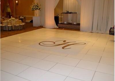 White tiled dance floor with drapes