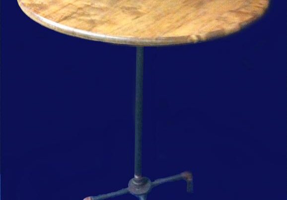Round wooden table with metal base